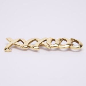 Gold chain link on white background.