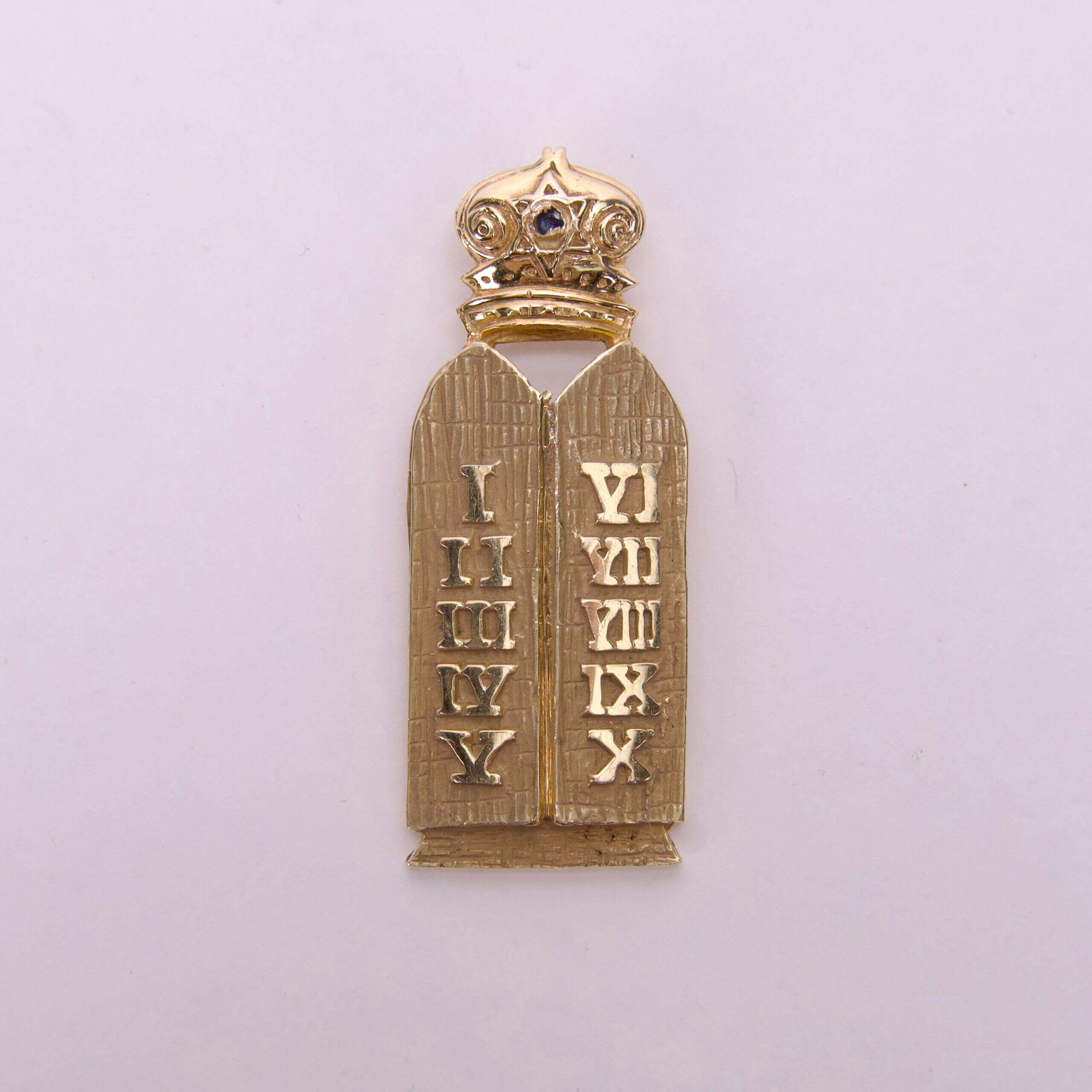 Gold Ten Commandments tablets with crown.