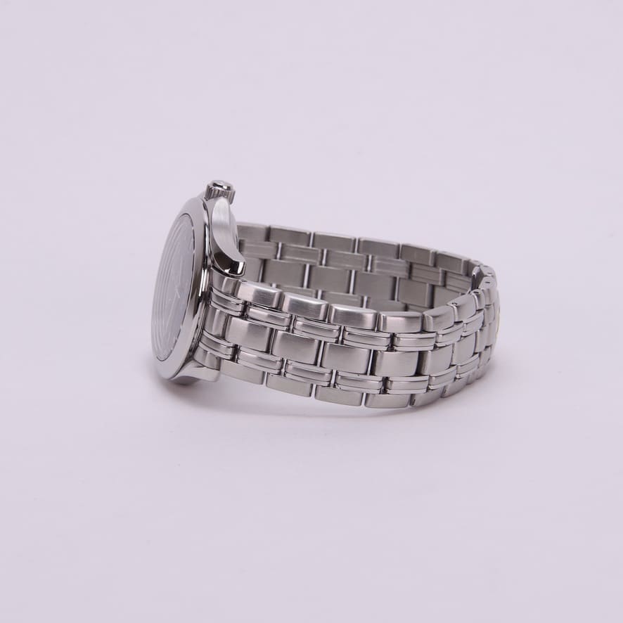 Silver wristwatch with metal link band.