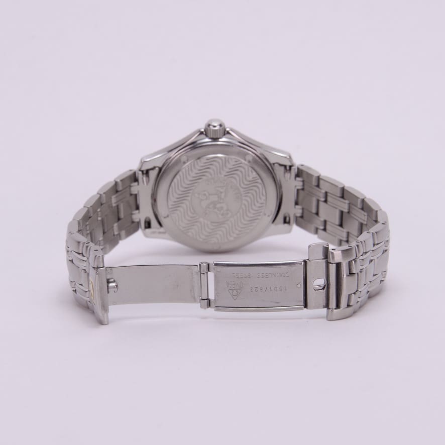 Back view of a silver wristwatch.