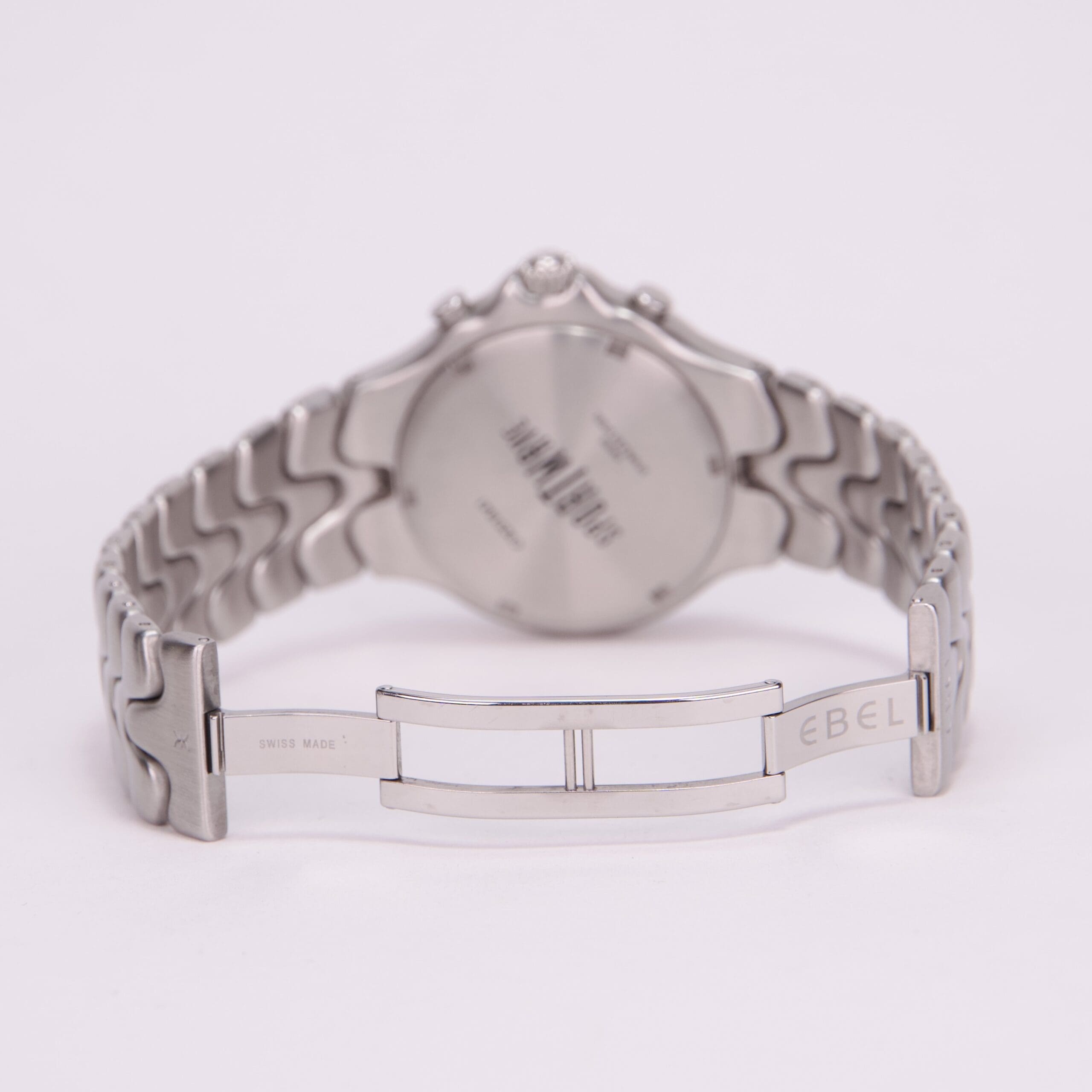 Back view of a silver wristwatch.