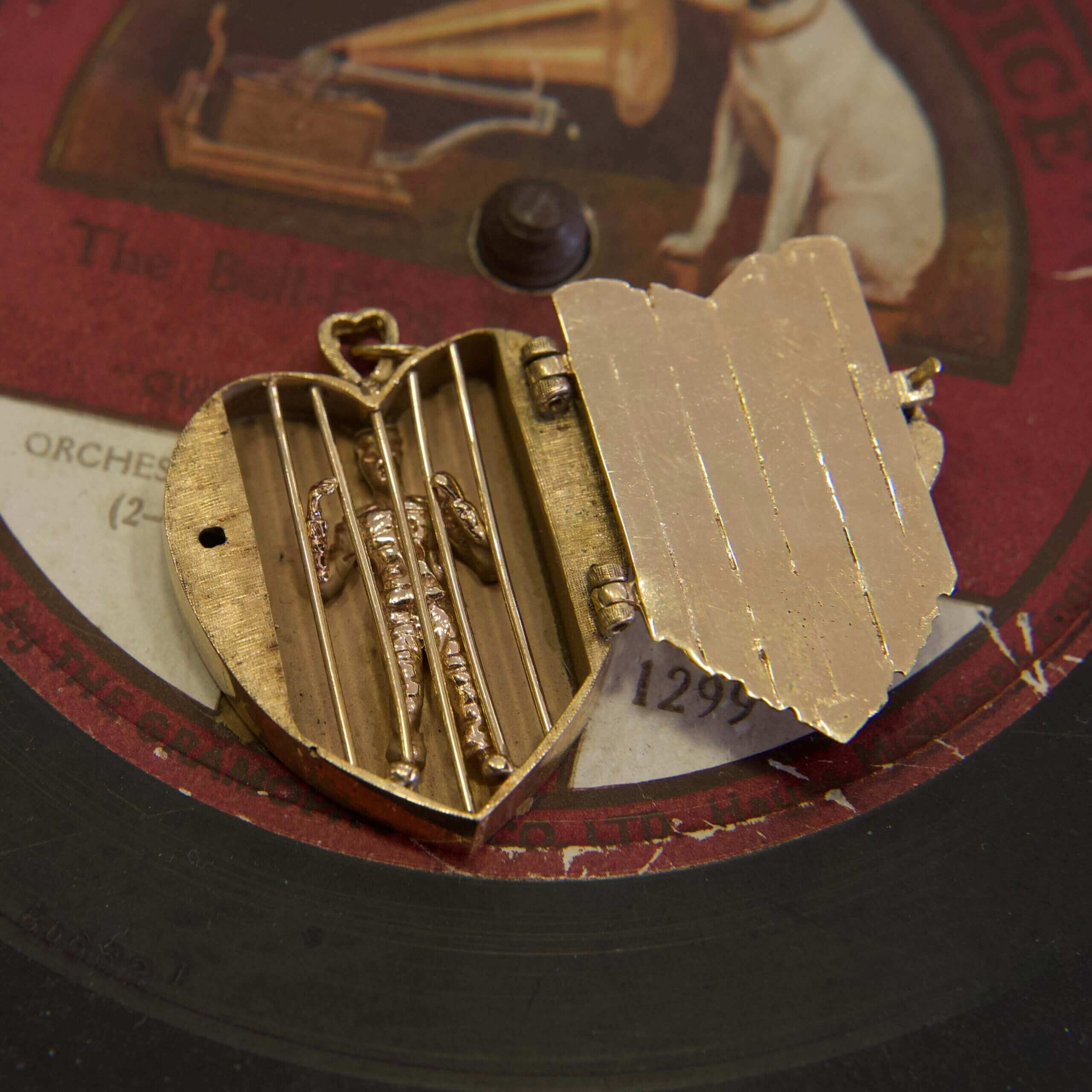 Heart locket on vintage record label.