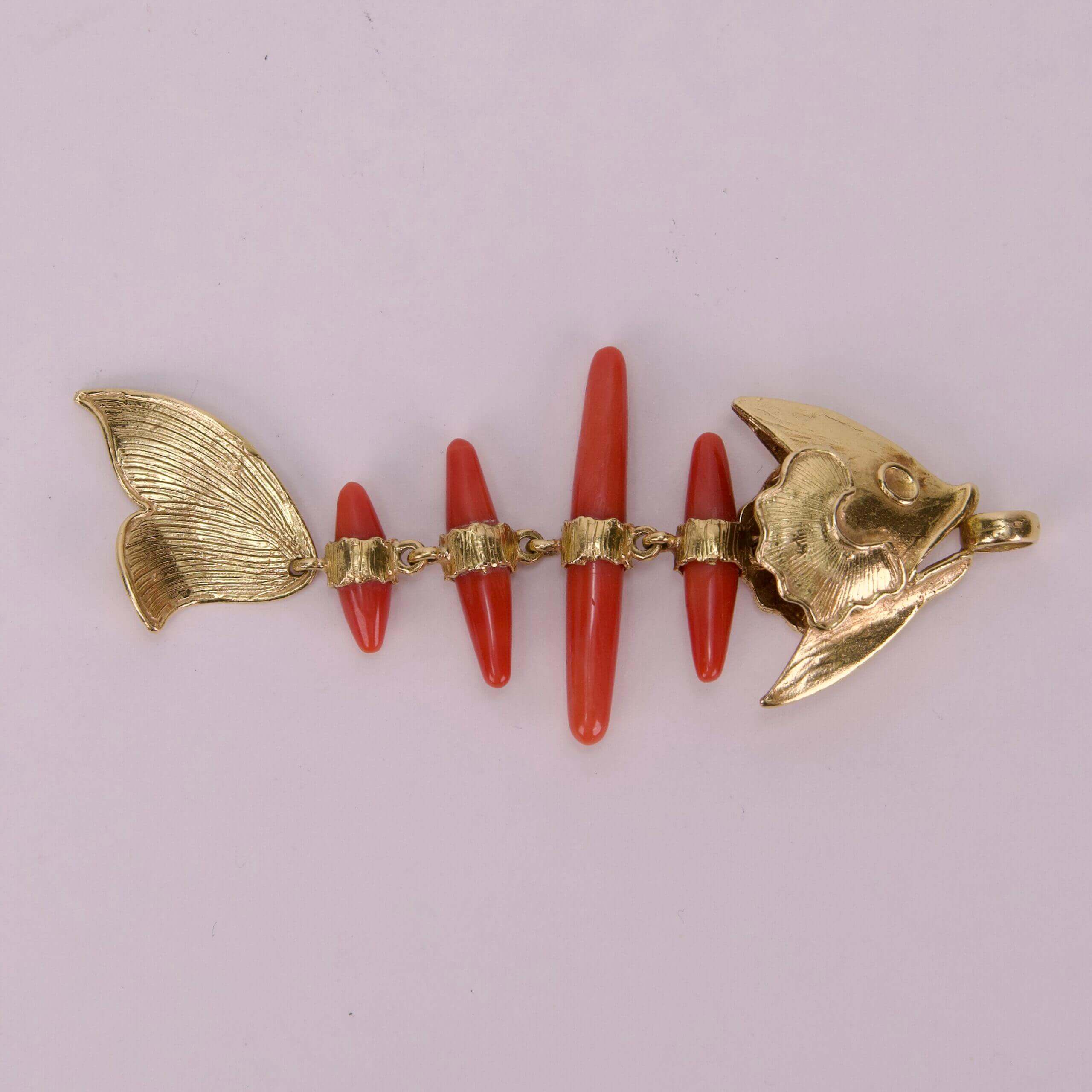 Gold fish skeleton with red accents.