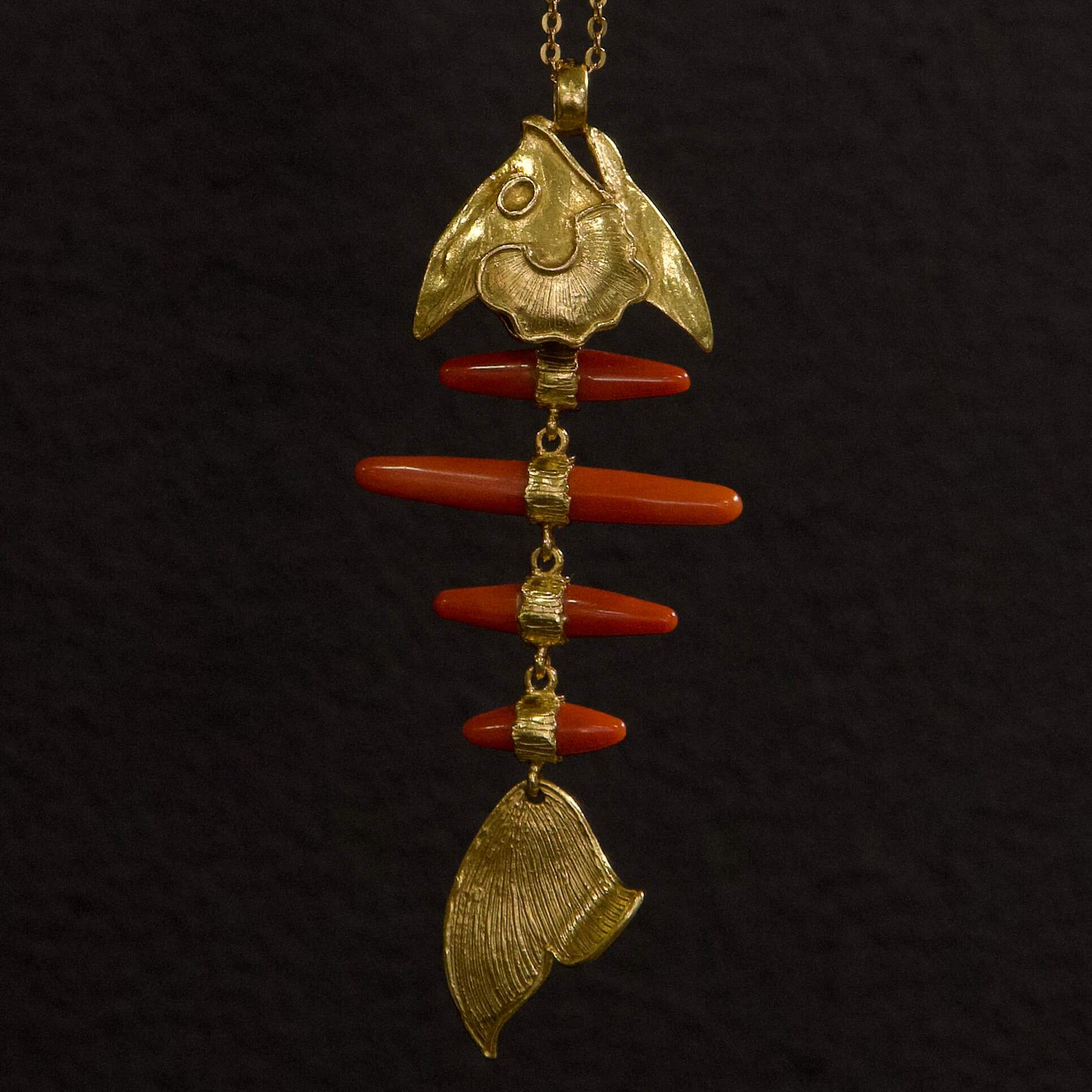 Gold and red fish pendant necklace.
