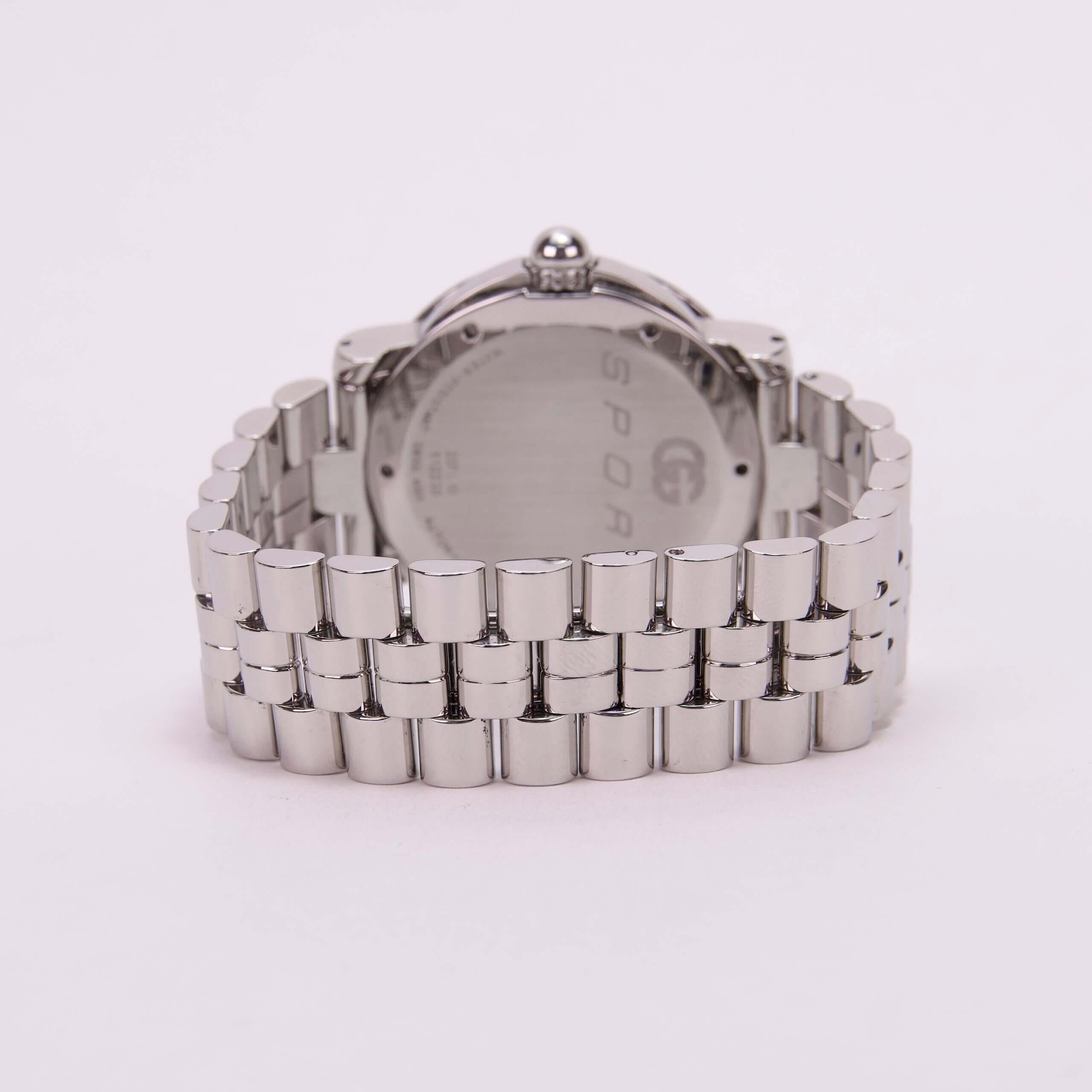 Silver metal watch with link bracelet.