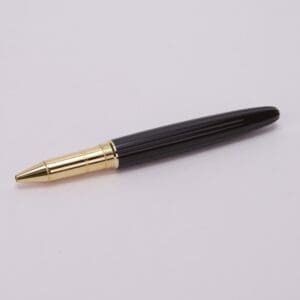 Black and gold luxury ballpoint pen.