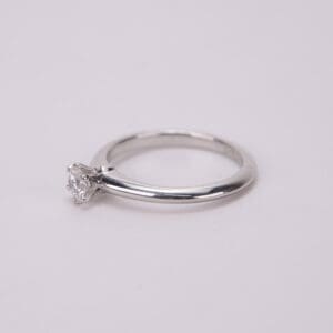 Diamond solitaire engagement ring on display.