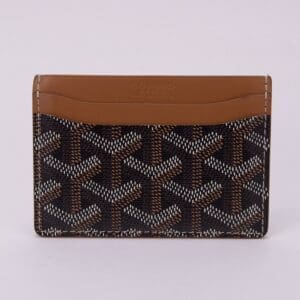 Brown and black patterned leather card holder.