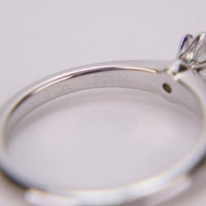 Engraved silver ring with a gemstone.