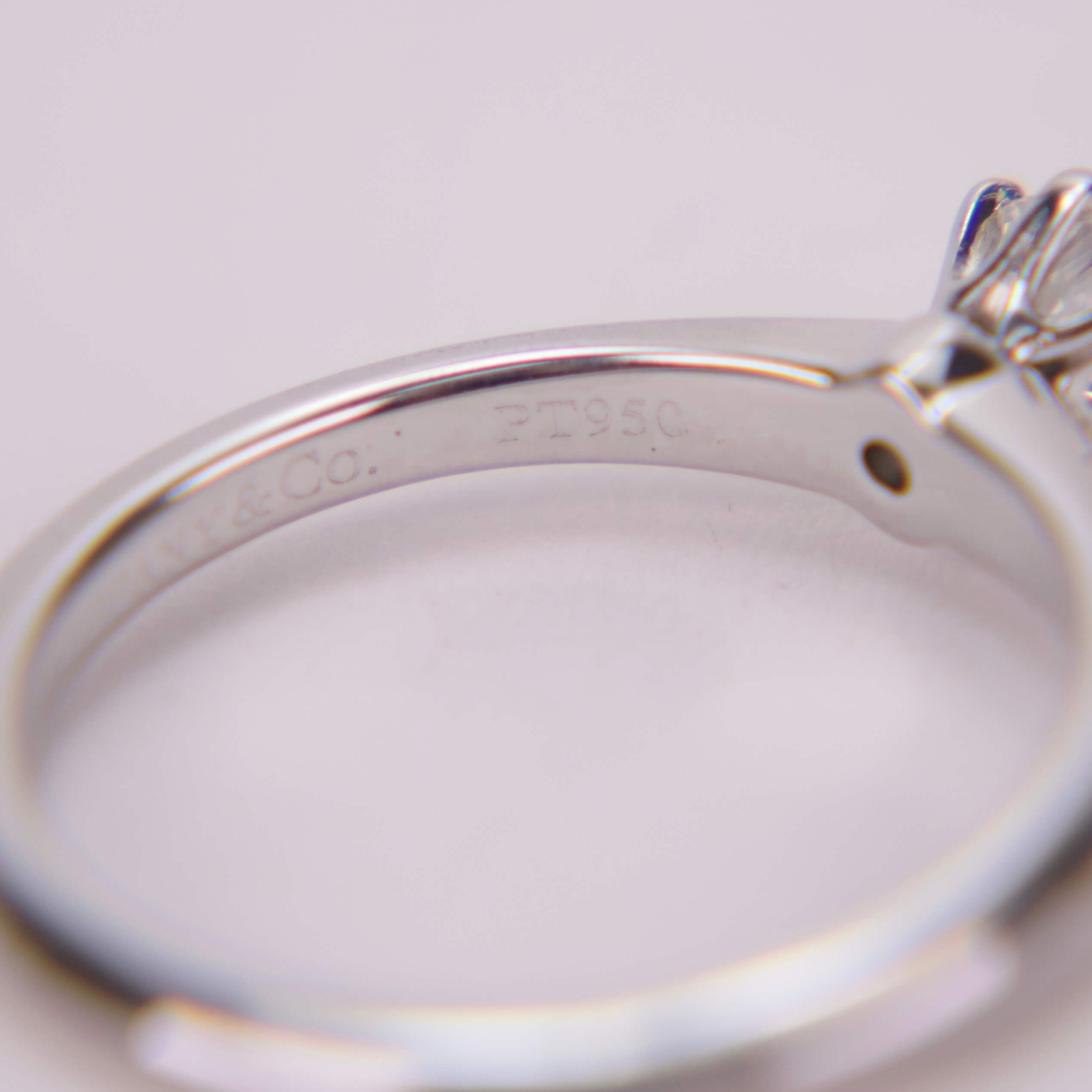 Engraved silver ring with a gemstone.