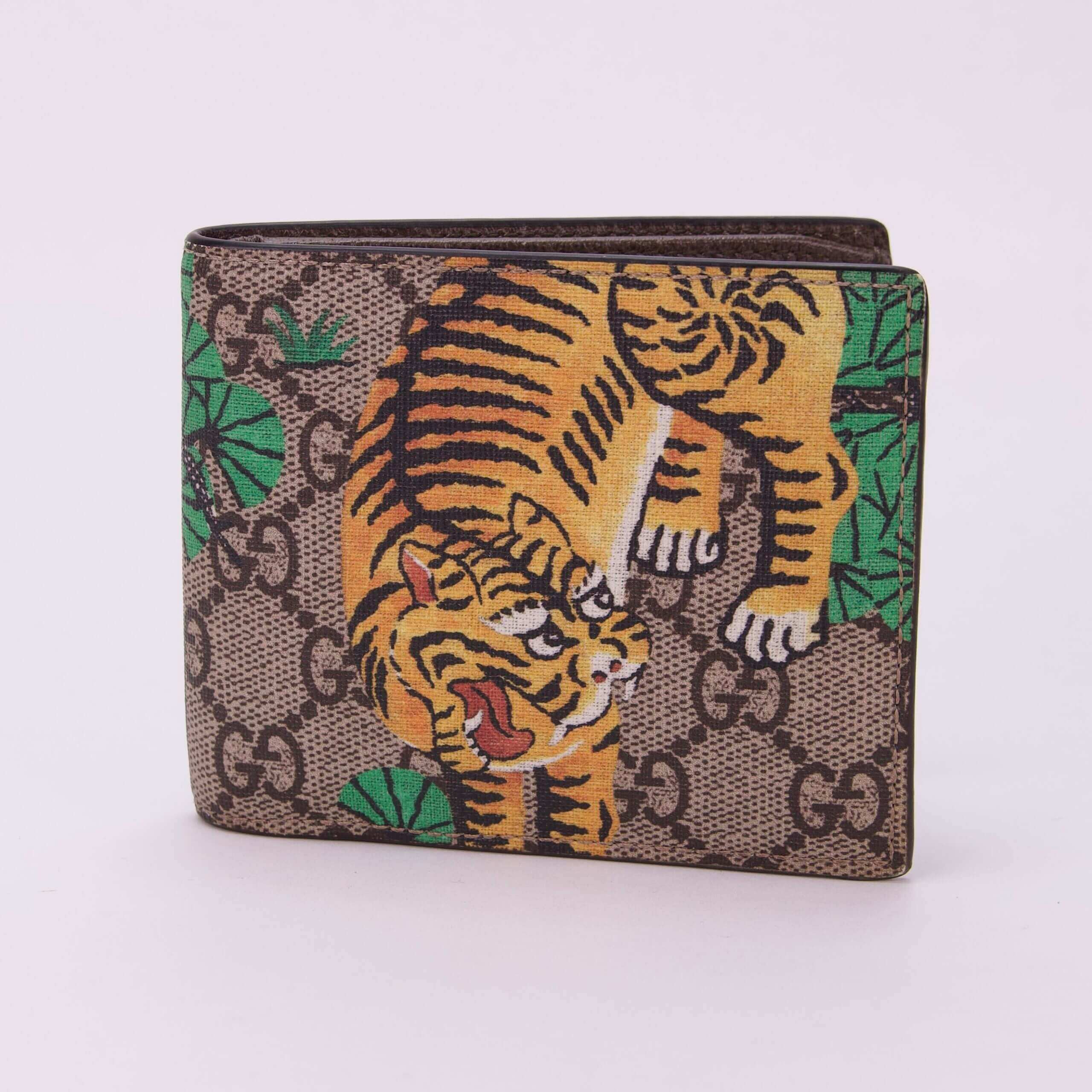 Tiger design wallet with green accents.