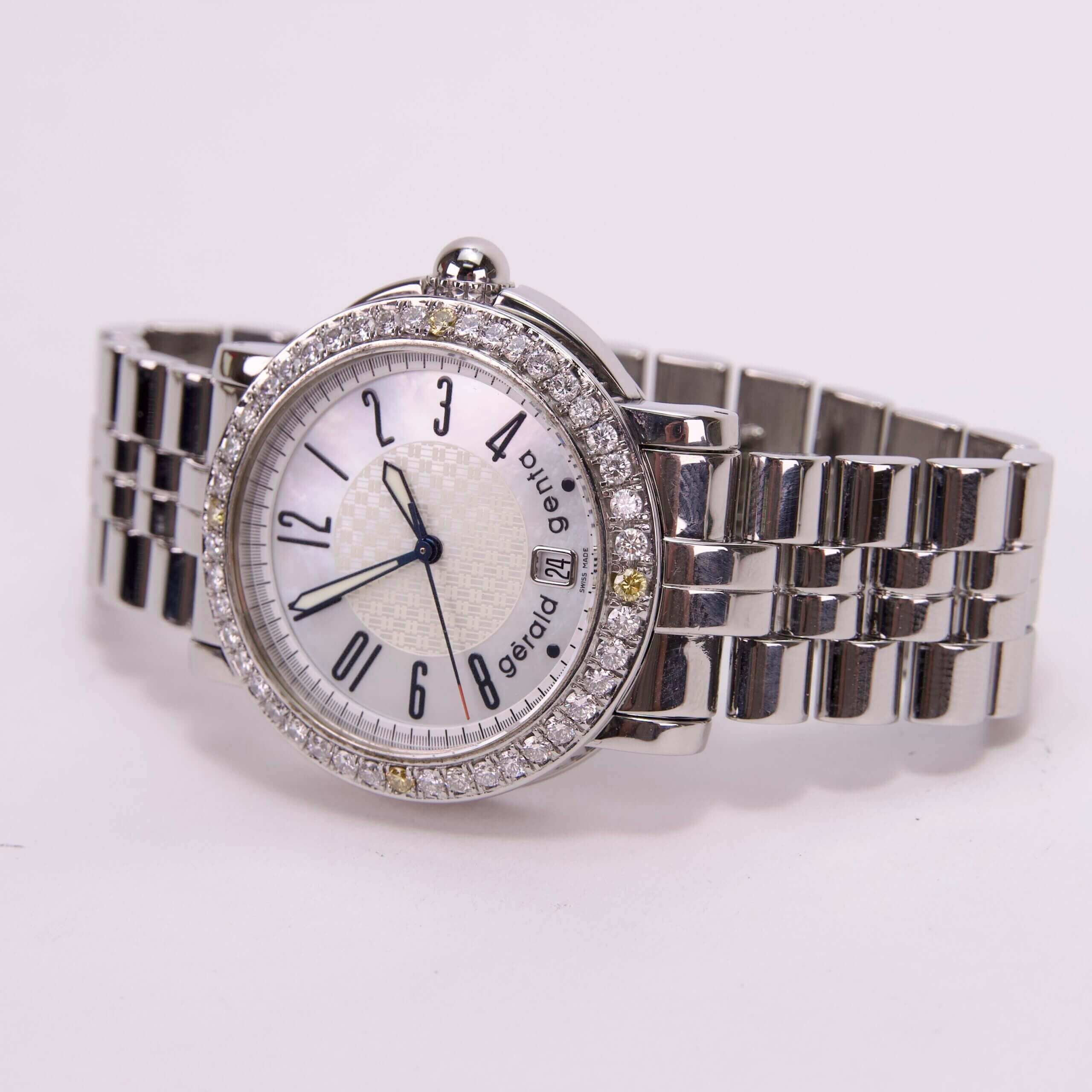 Silver wristwatch with diamond-encrusted bezel.