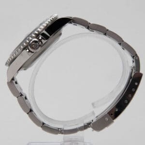 Silver wristwatch with metal link bracelet.