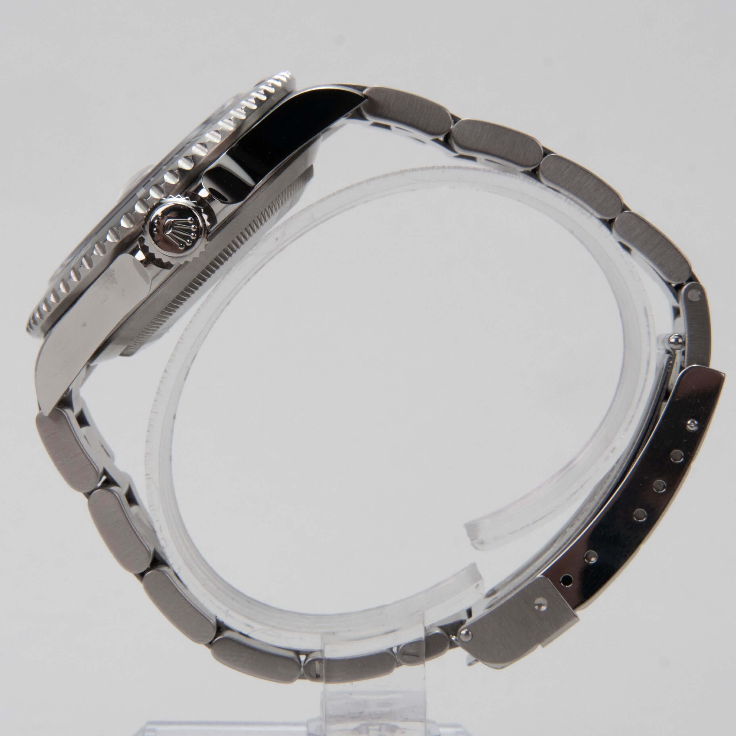 Silver wristwatch with metal link bracelet.