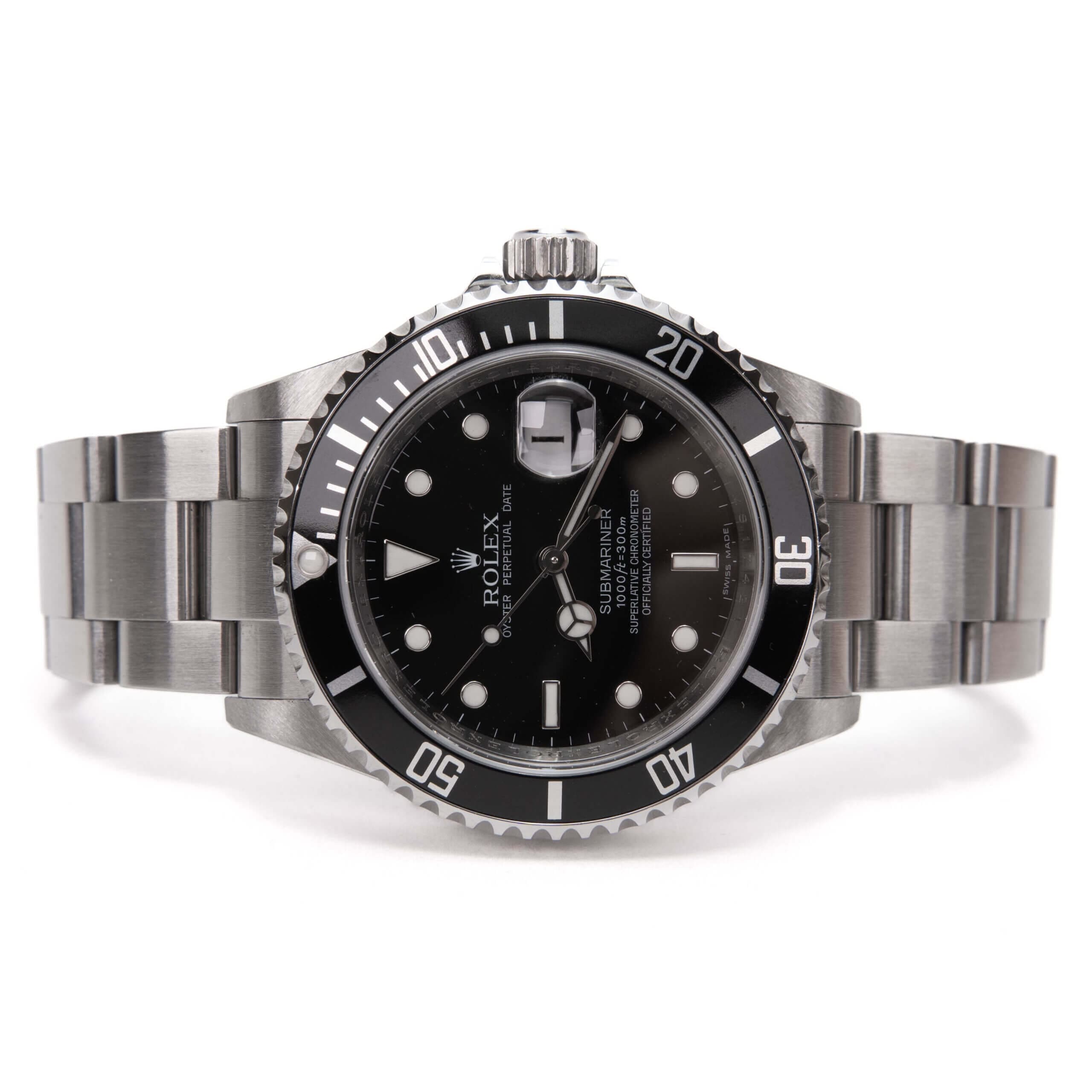 Luxury silver and black wristwatch display.