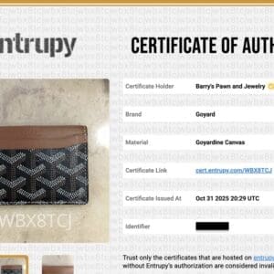 Goyard wallet with authenticity certificate displayed.