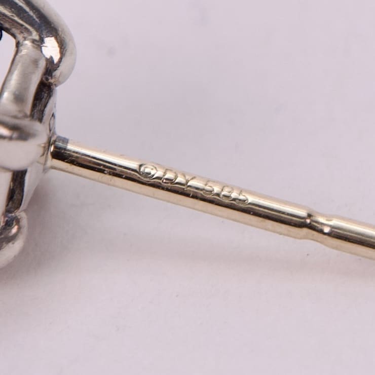 Close-up of a sterling silver jewelry clasp.