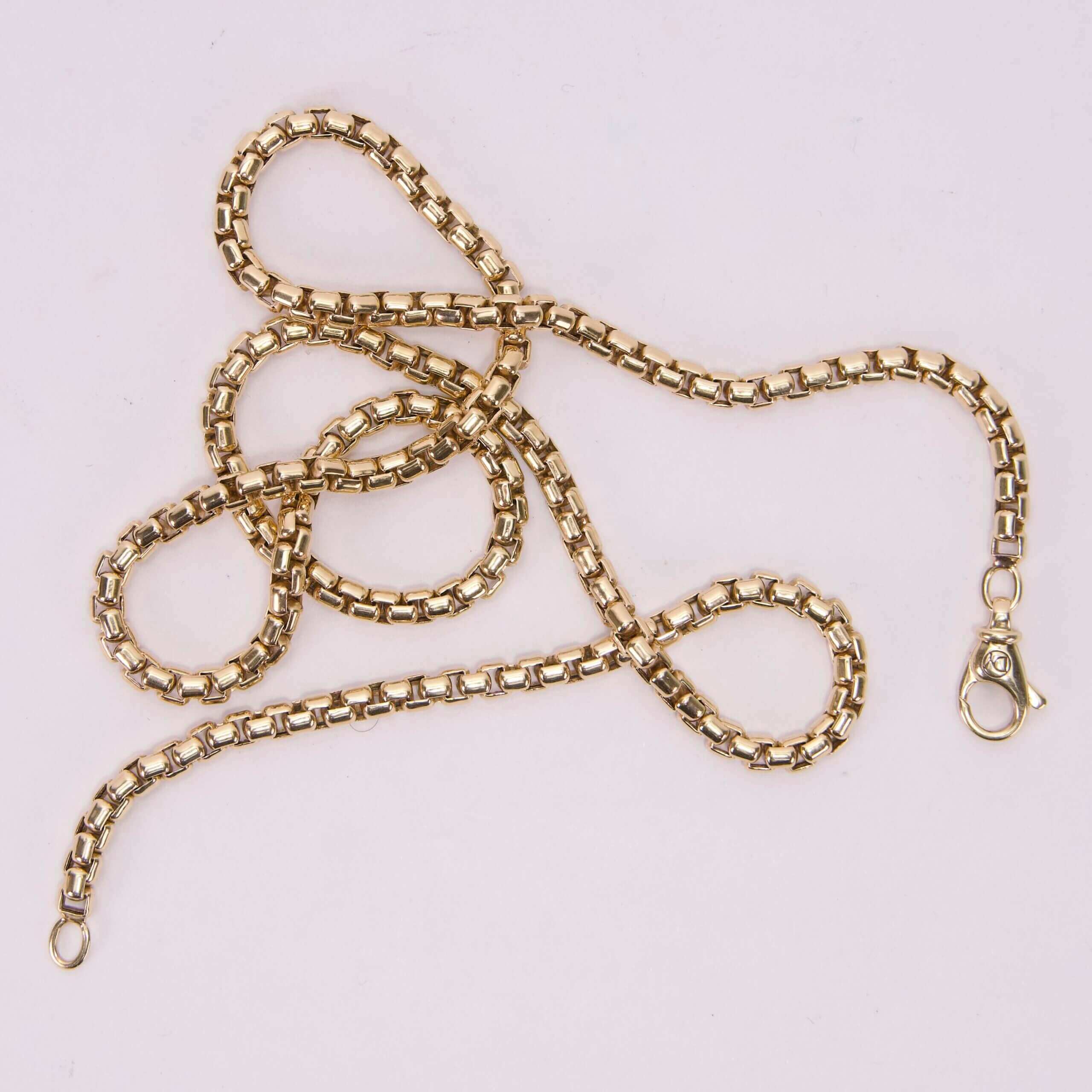 Gold chain necklace with lobster clasp.