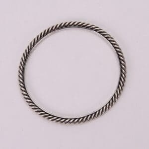 Silver twisted rope-style bracelet on display.