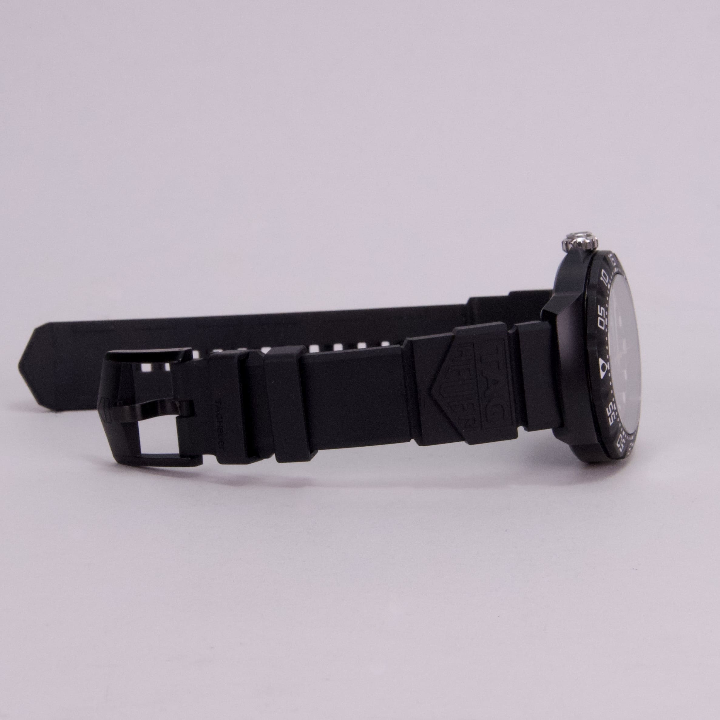 Black wristwatch with silicone strap.