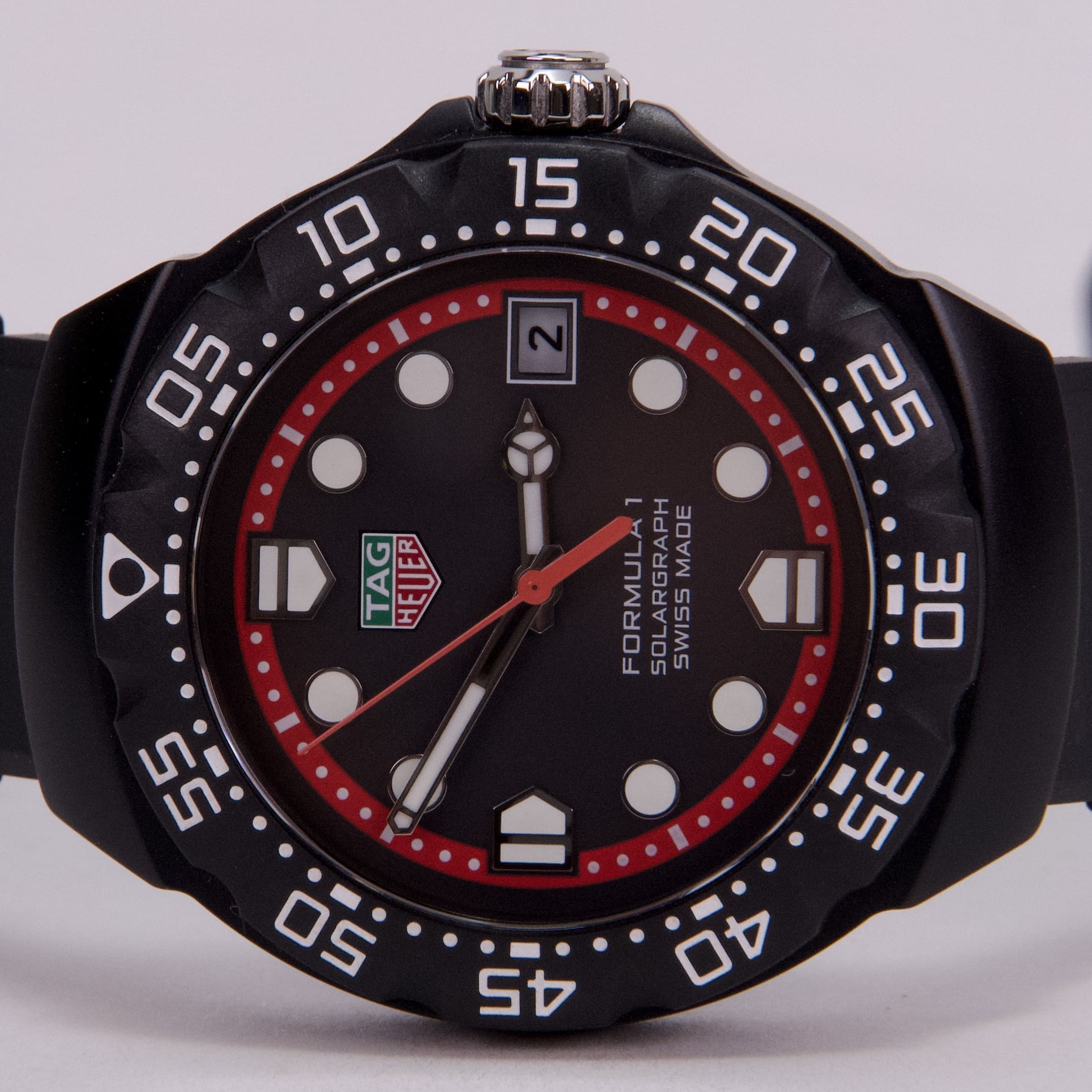 Black and red TAG Heuer Formula 1 watch.