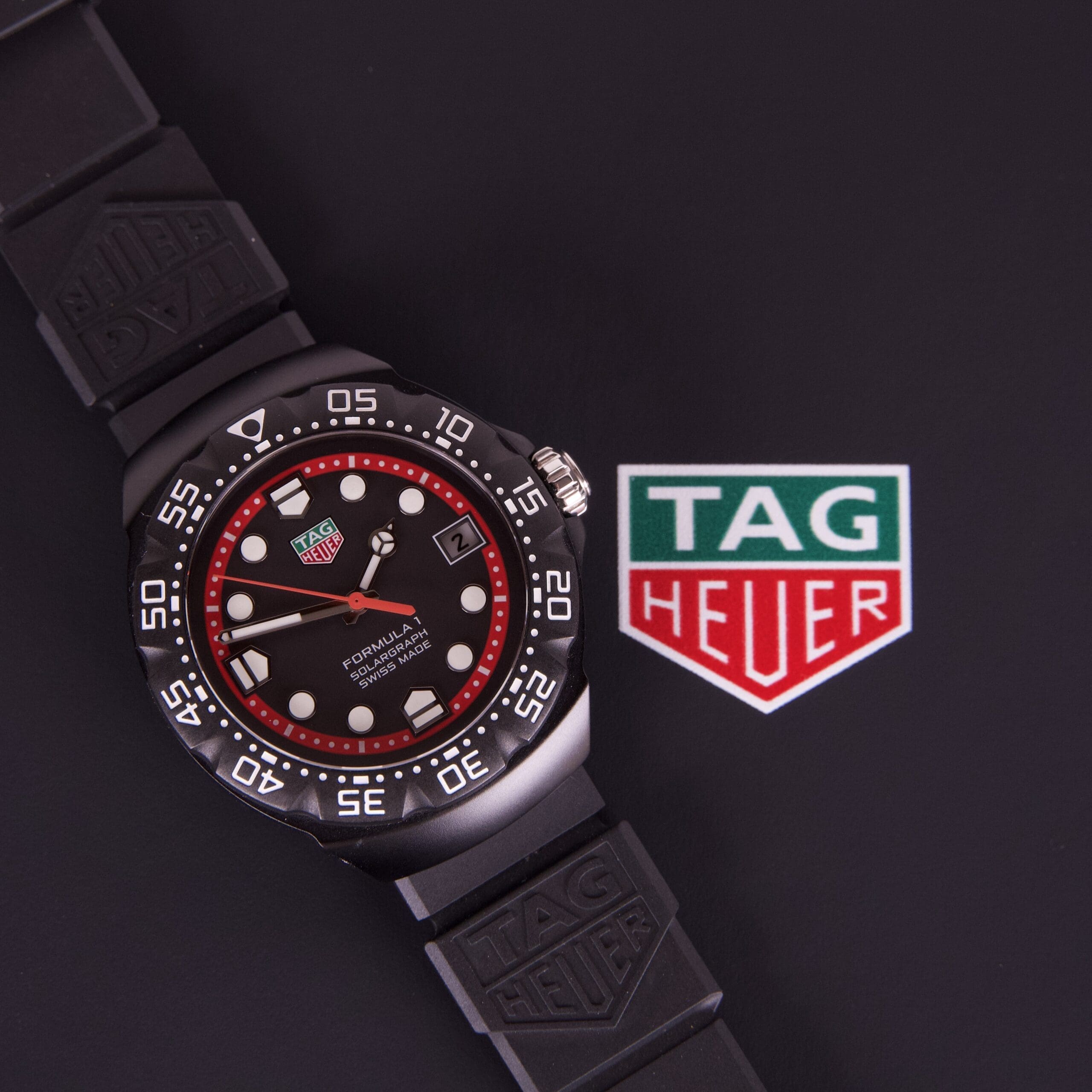TAG Heuer watch with black and red design.
