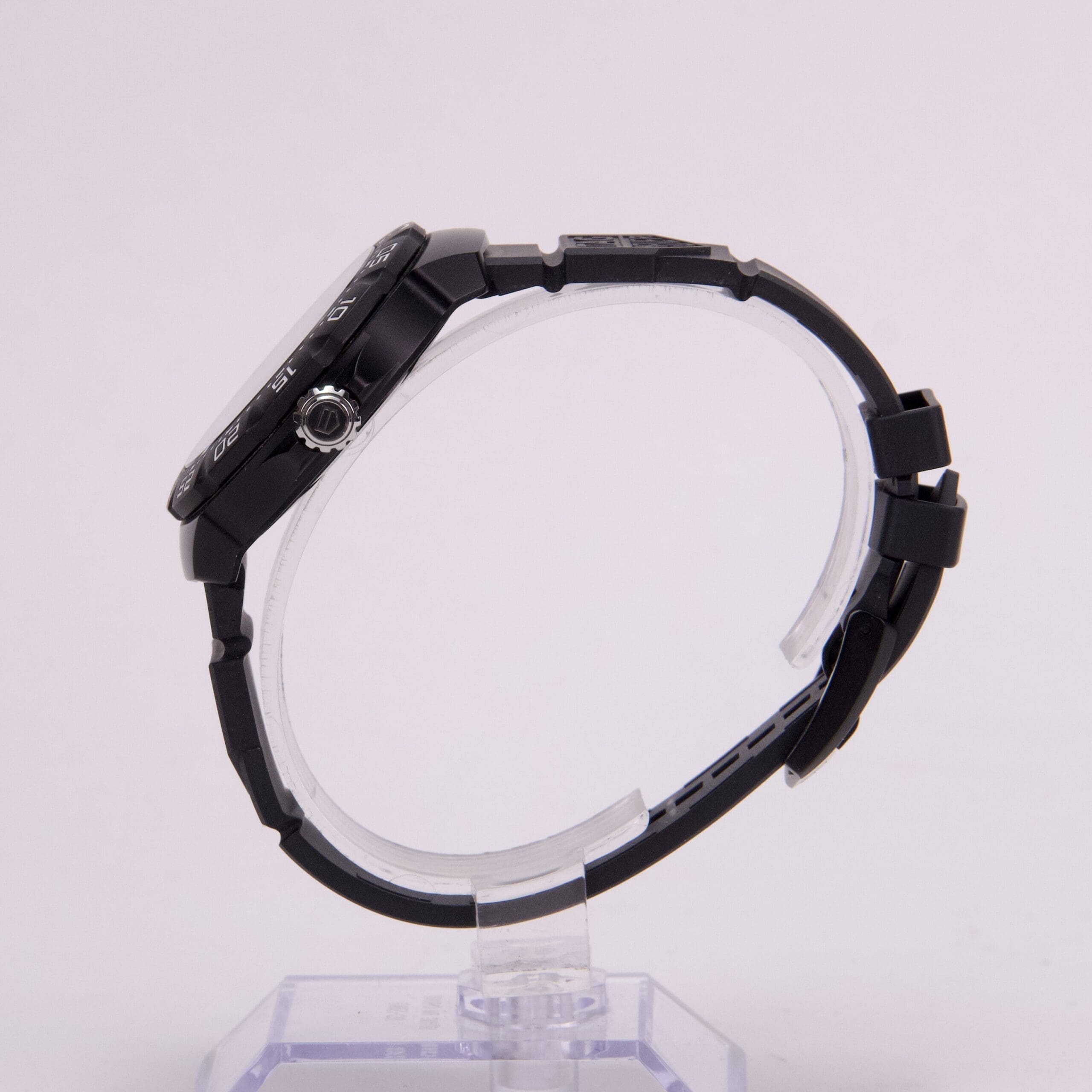 Side view of a black wristwatch.
