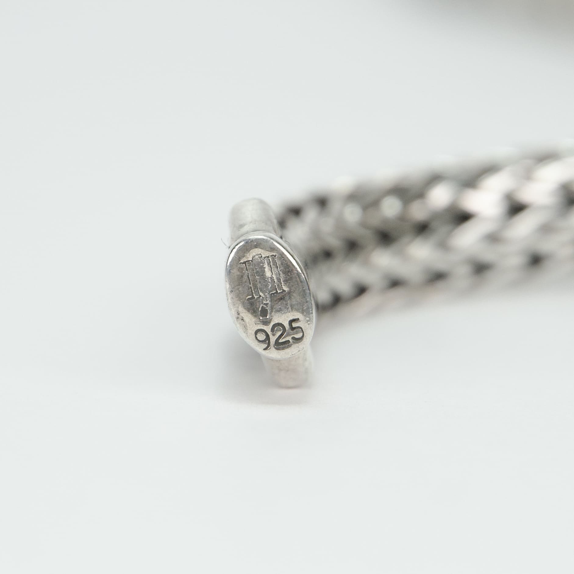 Silver chain with 925 hallmark stamp.