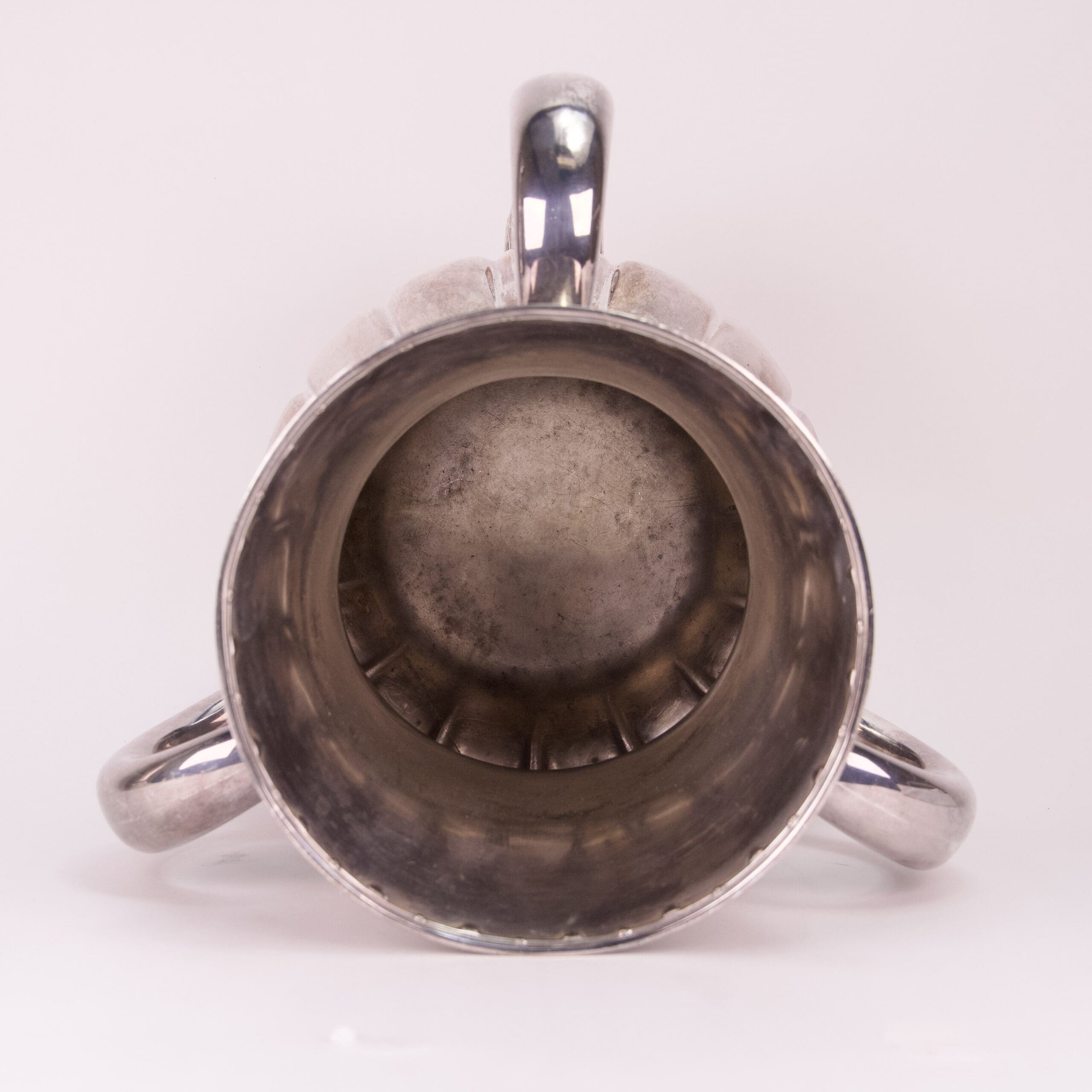 Silver trophy viewed from above.