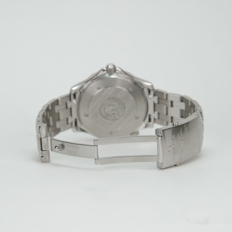 Silver wristwatch with open clasp.