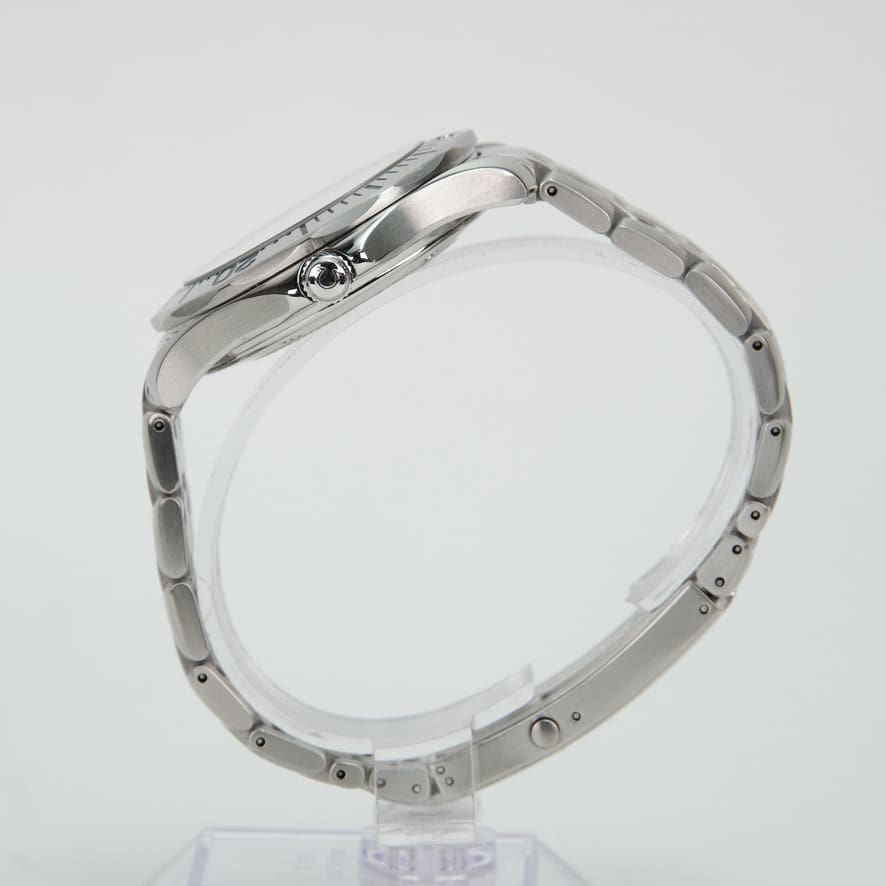 Silver watch with metal link bracelet.