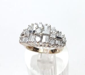 Diamond ring with baguette and round stones.