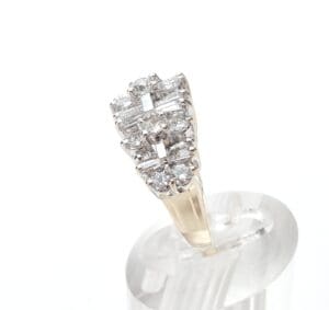 Gold ring with multiple sparkling diamonds.