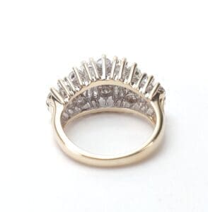 Gold ring with vertical diamond accents.