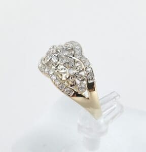 Gold ring with intricate diamond design.