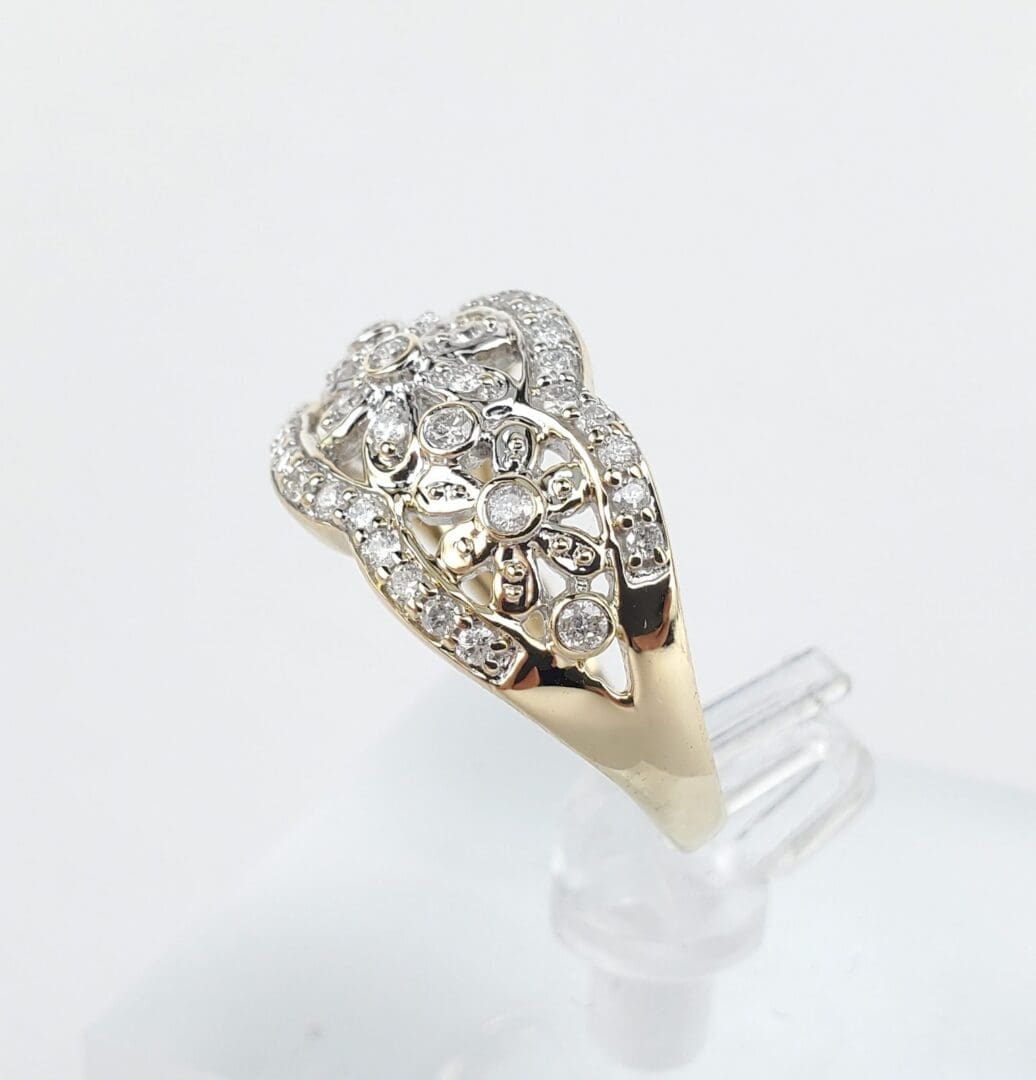 Gold ring with intricate diamond design.