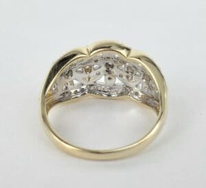 Gold ring interior with intricate design.