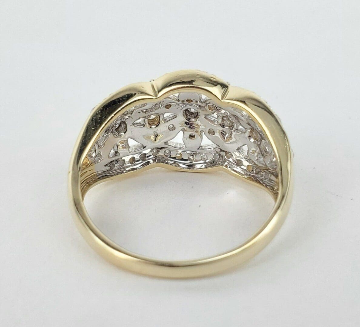 Gold ring interior with intricate design.