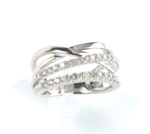Silver ring with intersecting diamond bands.