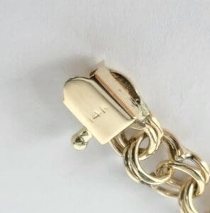 Gold chain clasp marked with 14k.