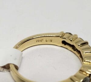 Gold ring with "14KF 585" engraving.
