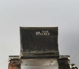 Silver jewelry clasp stamped "925 Italy".