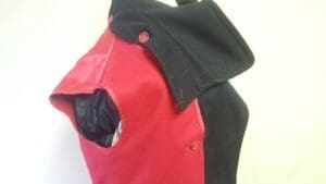 Red and black hooded garment on display.