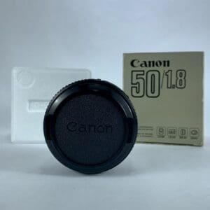 Canon 50mm lens cap and box.