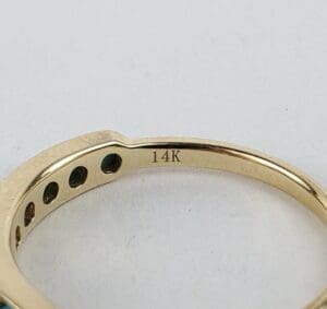Gold ring with 14K engraving.