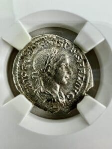 Ancient Roman coin with detailed profile engraving.