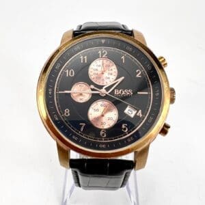 Luxury wristwatch with black and gold design.
