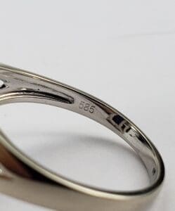 Gold ring with "585" hallmark inscription.