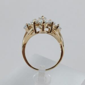 Gold ring with multiple small diamonds.