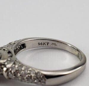 14KT diamond ring with intricate design.